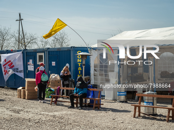 Ukrainian citizens are seen resting at the transit point for refugees in Palanca, south Moldova, on 2022-03-27. (