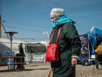 An Ukrainian grandmother is seen at the transit point for refugees in Palanca, south Moldova, on 2022-03-27. (