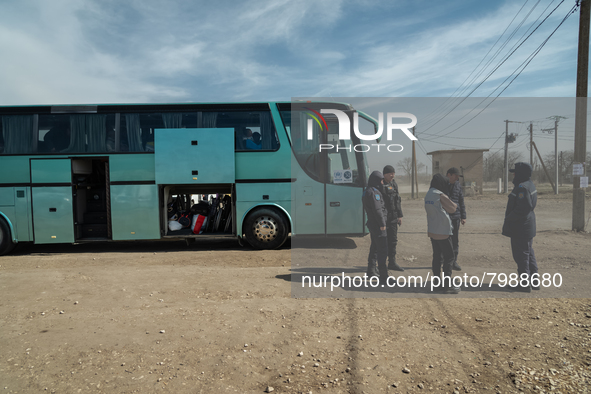 Humanitarian members and officers are seen waiting for the arrival of Ukrainian citizens at the transit point for refugees in Palanca, south...