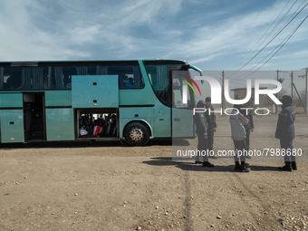 Humanitarian members and officers are seen waiting for the arrival of Ukrainian citizens at the transit point for refugees in Palanca, south...