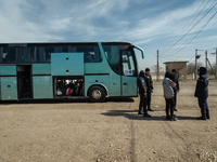 Humanitarian members and officers are seen waiting for the arrival of Ukrainian citizens at the transit point for refugees in Palanca, south...