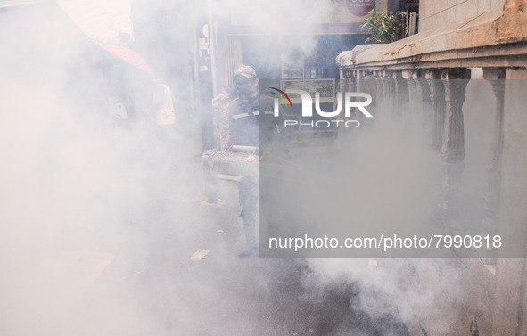 Health officials in the field of public environment carry out fumigation of the environment on residents in Grinding, Jakarta on March 29, 2...