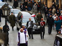 A photo of Polish composer and conductor Krzysztof Penderecki is carried during the funeral procession which walked through the Old Town in...