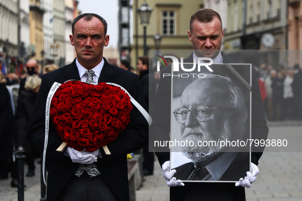 A photo of Polish composer and conductor Krzysztof Penderecki is carried during the funeral procession which walked through the Old Town in...