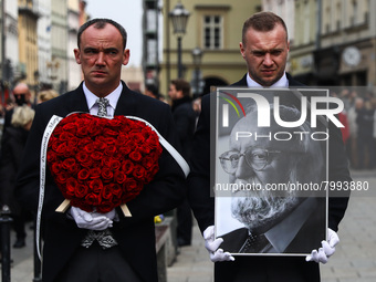 A photo of Polish composer and conductor Krzysztof Penderecki is carried during the funeral procession which walked through the Old Town in...