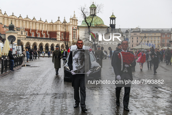 A photo of Polish composer and conductor Krzysztof Penderecki is carried during the funeral procession which walked through the Old Town in...