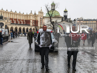 A photo of Polish composer and conductor Krzysztof Penderecki is carried during the funeral procession which walked through the Old Town in...