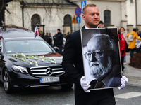 A photo of Polish composer and conductor Krzysztof Penderecki is carried during the funeral procession which walked through the Old Town in...