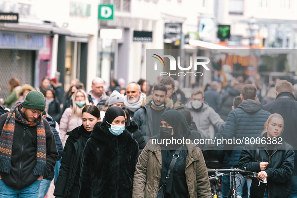 shoppers are seen, some with masks and some without masks  in city center of Bonn, Germany on April 2, 2022 as many rules of covid 19 will b...