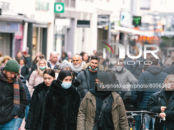 shoppers are seen, some with masks and some without masks  in city center of Bonn, Germany on April 2, 2022 as many rules of covid 19 will b...