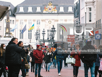 shoppers are seen, some with masks and some without masks  in city center of Bonn, Germany on April 2, 2022 as many rules of covid 19 will b...