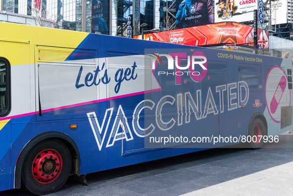 View at Bus for free vacination in Downtown Toronto, Canada. Mobile mobile clinics provide the opportunity to vaccinate everyone 