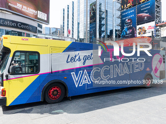 View at Bus for free vacination in Downtown Toronto, Canada. Mobile mobile clinics provide the opportunity to vaccinate everyone (