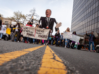 Students march around the Department of Education during event demanding student debt cancellation.  Hundreds of tudents took part in a day...