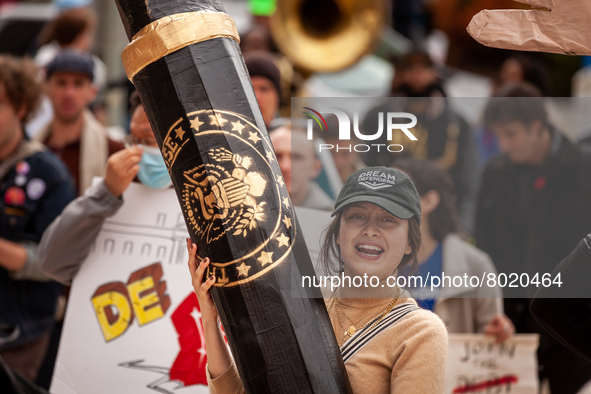 at a rally to cancel student debt at the Department of Education.  Students took part in a day of action urging President Biden to issue an...