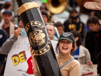 at a rally to cancel student debt at the Department of Education.  Students took part in a day of action urging President Biden to issue an...