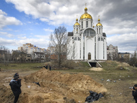 Bodies of civil locals in plastic bags lay in a mass grave in the recaptured by the Ukrainian army Bucha city of Kyiv area, Ukraine, 04 Apri...