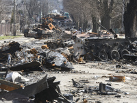 Street with destroyed Russian military machinery in the recaptured by the Ukrainian army Bucha city near Kyiv, Ukraine, 04 April 2022. (