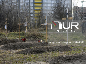 Graves with bodies of civilians next to apartments blocks in the recaptured by the Ukrainian army Bucha city near Kyiv, Ukraine, 04 April 20...