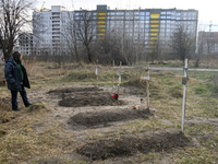 Graves with bodies of civilians next to apartments blocks in the recaptured by the Ukrainian army Bucha city near Kyiv, Ukraine, 04 April 20...