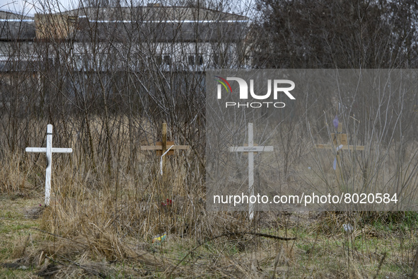 Graves with bodies of civilians next to apartments blocks in the recaptured by the Ukrainian army Bucha city near Kyiv, Ukraine, 04 April 20...