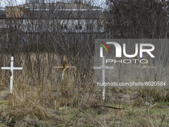 Graves with bodies of civilians next to apartments blocks in the recaptured by the Ukrainian army Bucha city near Kyiv, Ukraine, 04 April 20...