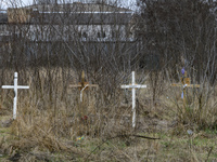 Graves with bodies of civilians next to apartments blocks in the recaptured by the Ukrainian army Bucha city near Kyiv, Ukraine, 04 April 20...