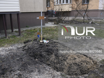 Graves with bodies of civilians next to apartments blocks in the recaptured by the Ukrainian army Bucha city near Kyiv, Ukraine, 04 April 20...