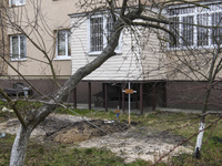 Graves with bodies of civilians next to apartments blocks in the recaptured by the Ukrainian army Bucha city near Kyiv, Ukraine, 04 April 20...