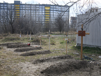 Graves with bodies of civilians next to apartments blocks in the recaptured by the Ukrainian army Bucha city near Kyiv, Ukraine, 04 April 20...