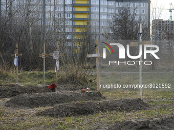 Graves with bodies of civilians next to apartments blocks in the recaptured by the Ukrainian army Bucha city near Kyiv, Ukraine, 04 April 20...