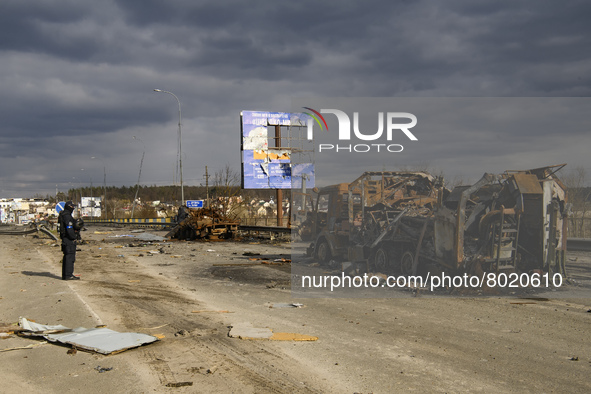 Destroyed Russian military machinery on a damaged bridge in the recaptured by the Ukrainian army Bucha city near Kyiv, Ukraine, 04 April 202...