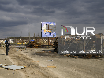 Destroyed Russian military machinery on a damaged bridge in the recaptured by the Ukrainian army Bucha city near Kyiv, Ukraine, 04 April 202...