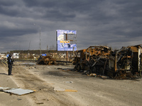 Destroyed Russian military machinery on a damaged bridge in the recaptured by the Ukrainian army Bucha city near Kyiv, Ukraine, 04 April 202...