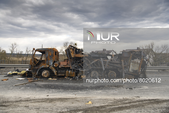 Destroyed Russian military machinery on a damaged bridge in the recaptured by the Ukrainian army Bucha city near Kyiv, Ukraine, 04 April 202...