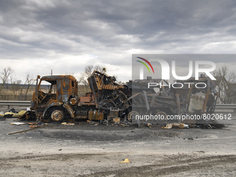 Destroyed Russian military machinery on a damaged bridge in the recaptured by the Ukrainian army Bucha city near Kyiv, Ukraine, 04 April 202...