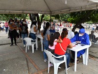 Large numbers of people line up to receive the anti-Covid-19 vaccine dose in La Parada neighborhood, near the city of Cúcuta on the Colombia...