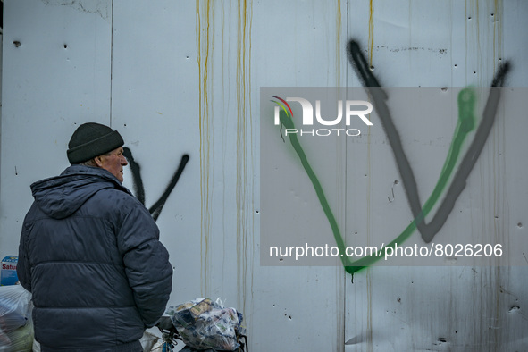 Graffities with the letter V, symbol of the russian troops during the occupation of the north part of Ukraine, in the city of Borodianka, af...