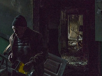 A man recover some belongings of his destroyed flat during the combats between the ukrainian and russian armies in Borodianka, Ukraine. (