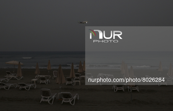 Haze hangs over Finikoundes beach in the evening in Larnaca. Cyprus, Wednesday, April 6, 2022. The U.N. health agency says nearly everybody...