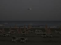 Haze hangs over Finikoundes beach in the evening in Larnaca. Cyprus, Wednesday, April 6, 2022. The U.N. health agency says nearly everybody...