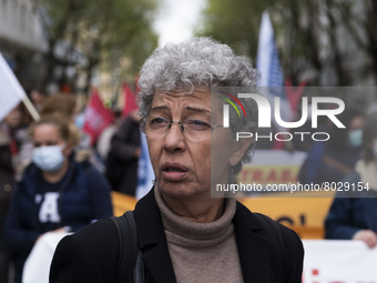 Isabel Camarinha from CGTP, General Confederation of Portuguese Workers in front of the Ministry of Health manifests itself in better condit...