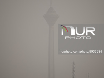 A view of northwestern Tehran and Milad telecommunication tower during a polluted air, on April 8, 2022. (