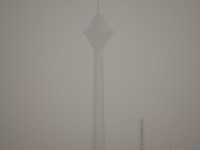 A view of northwestern Tehran and Milad telecommunication tower during a polluted air, on April 8, 2022. (