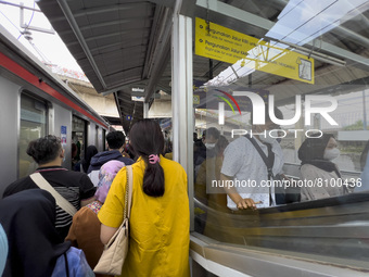 People at Tanah Abang Station, Jakarta, Indonesia, on April 20, 2022 amid the COVID-19 pandemic.(