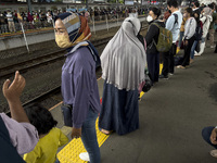 People at Tanah Abang Station, Jakarta, Indonesia, on April 20, 2022 amid the COVID-19 pandemic.(