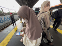 People at Tanah Abang Station, Jakarta, Indonesia, on April 20, 2022 amid the COVID-19 pandemic.(