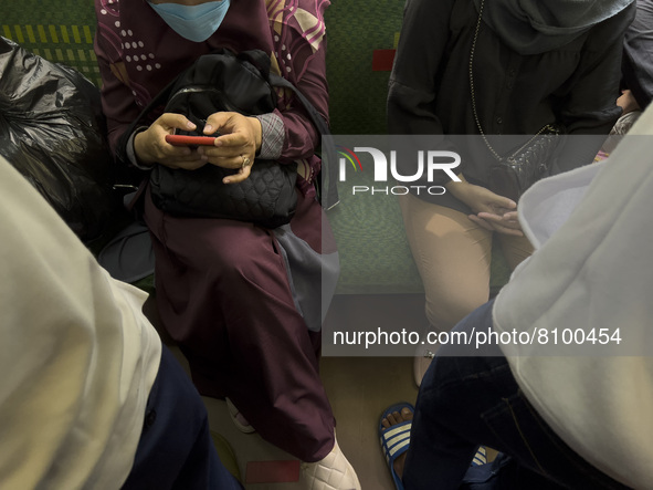 People at Tanah Abang Station, Jakarta, Indonesia, on April 20, 2022 amid the COVID-19 pandemic.