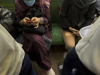 People at Tanah Abang Station, Jakarta, Indonesia, on April 20, 2022 amid the COVID-19 pandemic.(