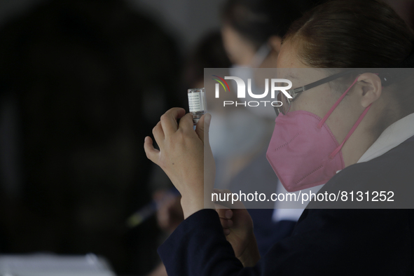 A group of nurses in a vaccination unit at the Constitución de 1917 metro station in Mexico City, where the AstraZeneca biological is being...